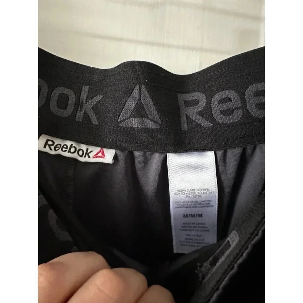 Reebok Men’s size Medium gray & black shorts